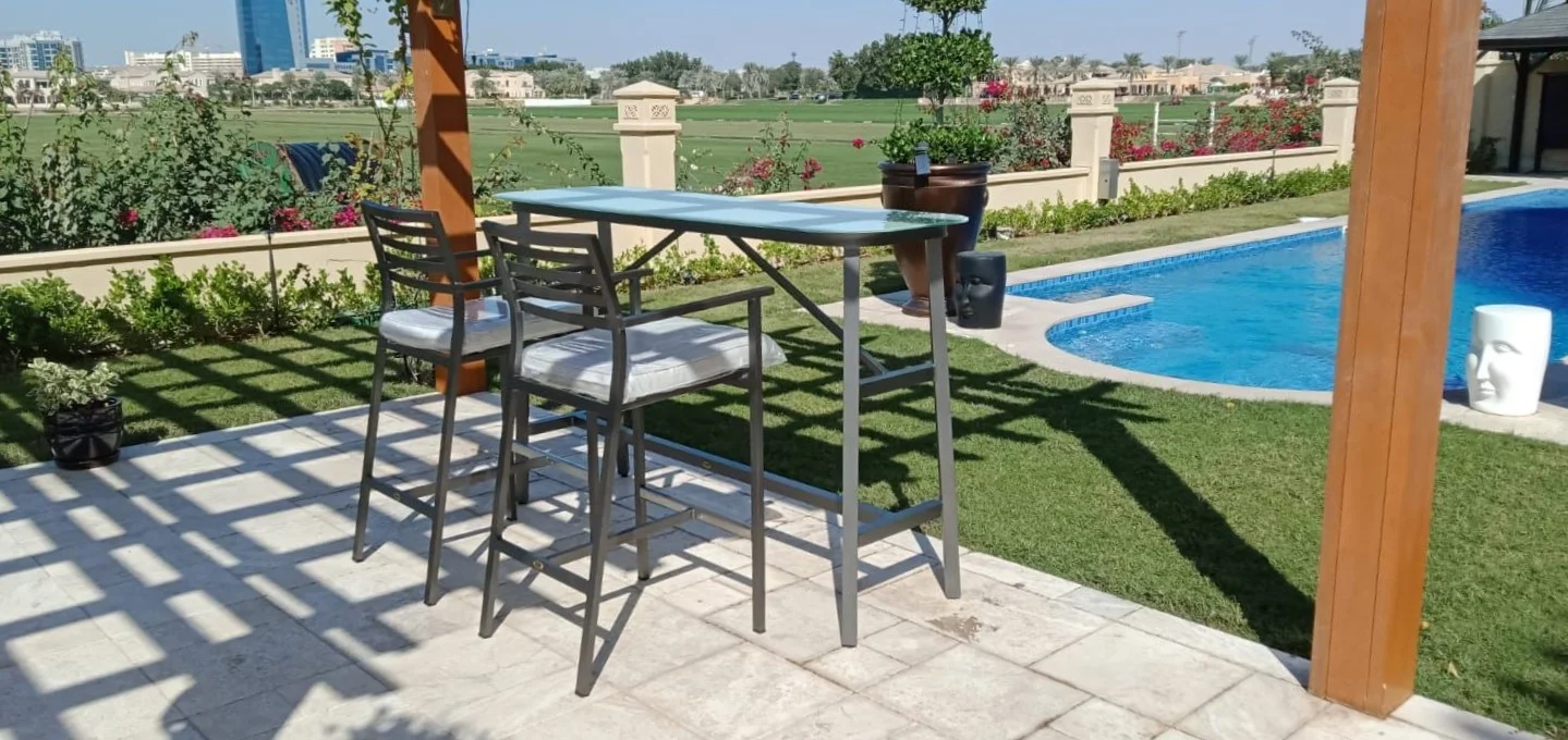Outdoor high top table and bar chairs